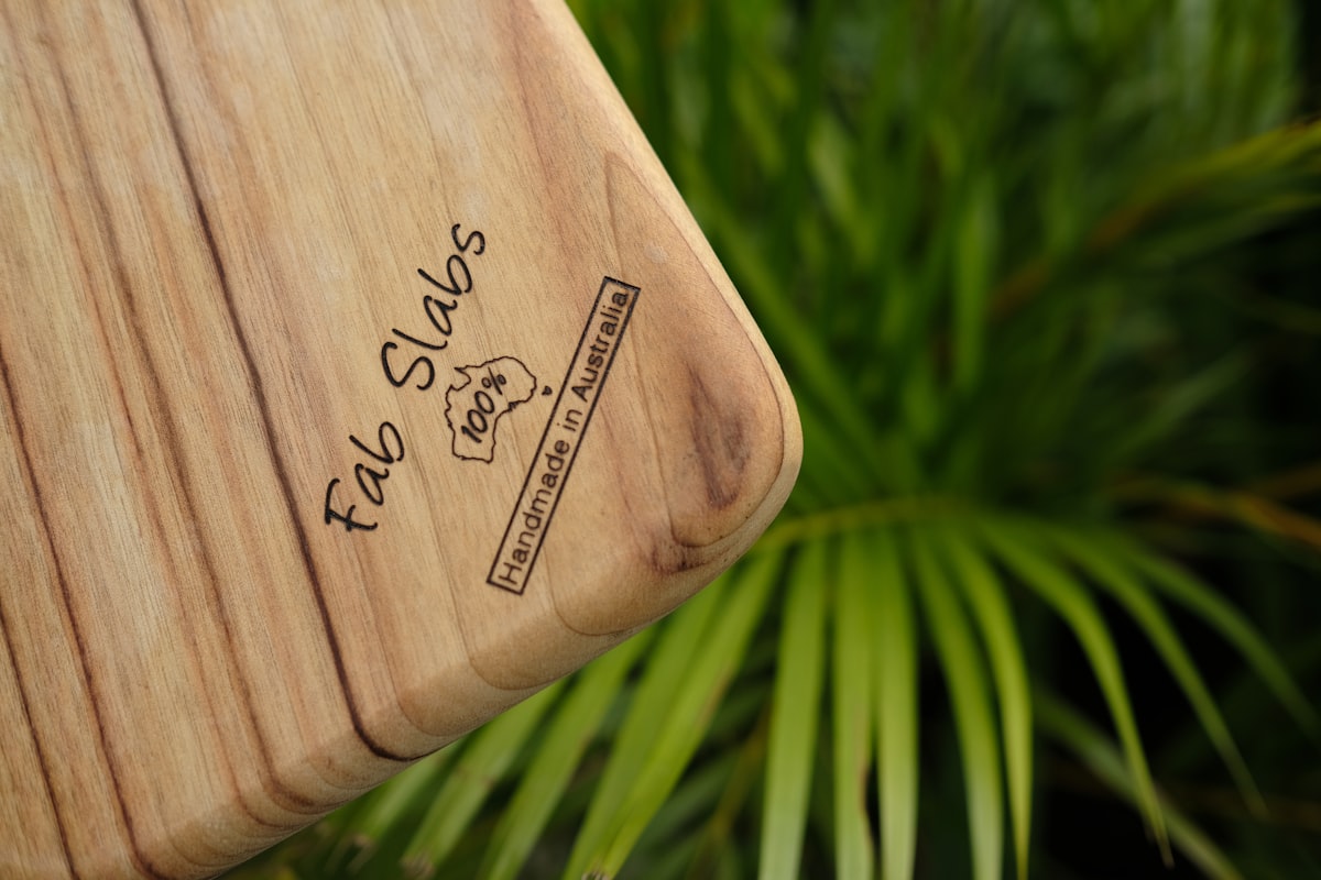 a close up of a wooden case with a plant in the background related to Elevate Your Home Decor with Teak Sideboards for Sale
