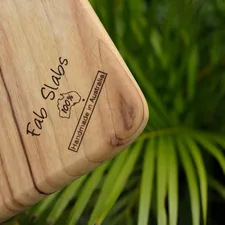 a close up of a wooden case with a plant in the background related to Elevate Your Home Decor with Teak Sideboards for Sale