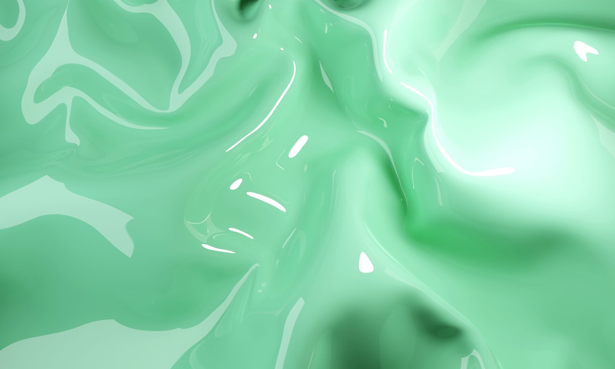A close up view of a green liquid related to Seafoam Green Coverlet