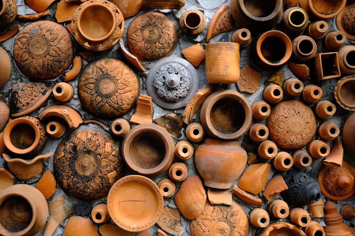 a collection of clay pots and vases on display related to Where to Buy Clay Chiminea: A Comprehensive Guide