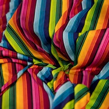 A colourful cloth, part of a display at a hotel in Dubai. related to Vibrant Bedding Essentials: Colorful Quilts and Coverlets