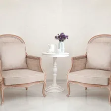 a couple of chairs sitting next to each other related to Timeless Elegance: French Style Sideboards