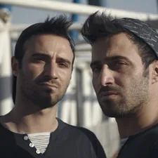 a couple of men standing next to each other related to Understanding Twin Bed Frame Dimensions