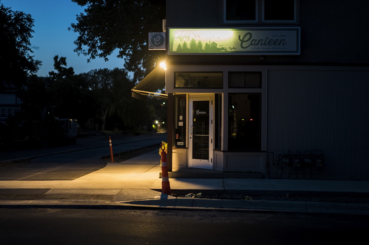 a dark street at night with a restaurant lit up related to Discover the Best Bed and Breakfasts in Minnesota