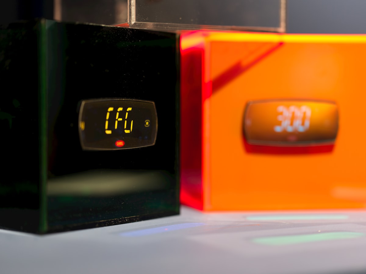 A digital clock sitting on top of a table related to Exploring Indoor Tanning Options at Your Gym