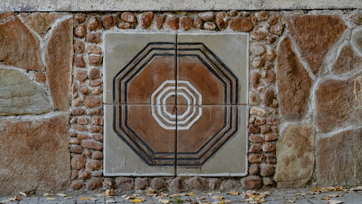 a door in a brick wall related to Entryway Tile Medallions: Adding Elegance to Your Home's Foyer