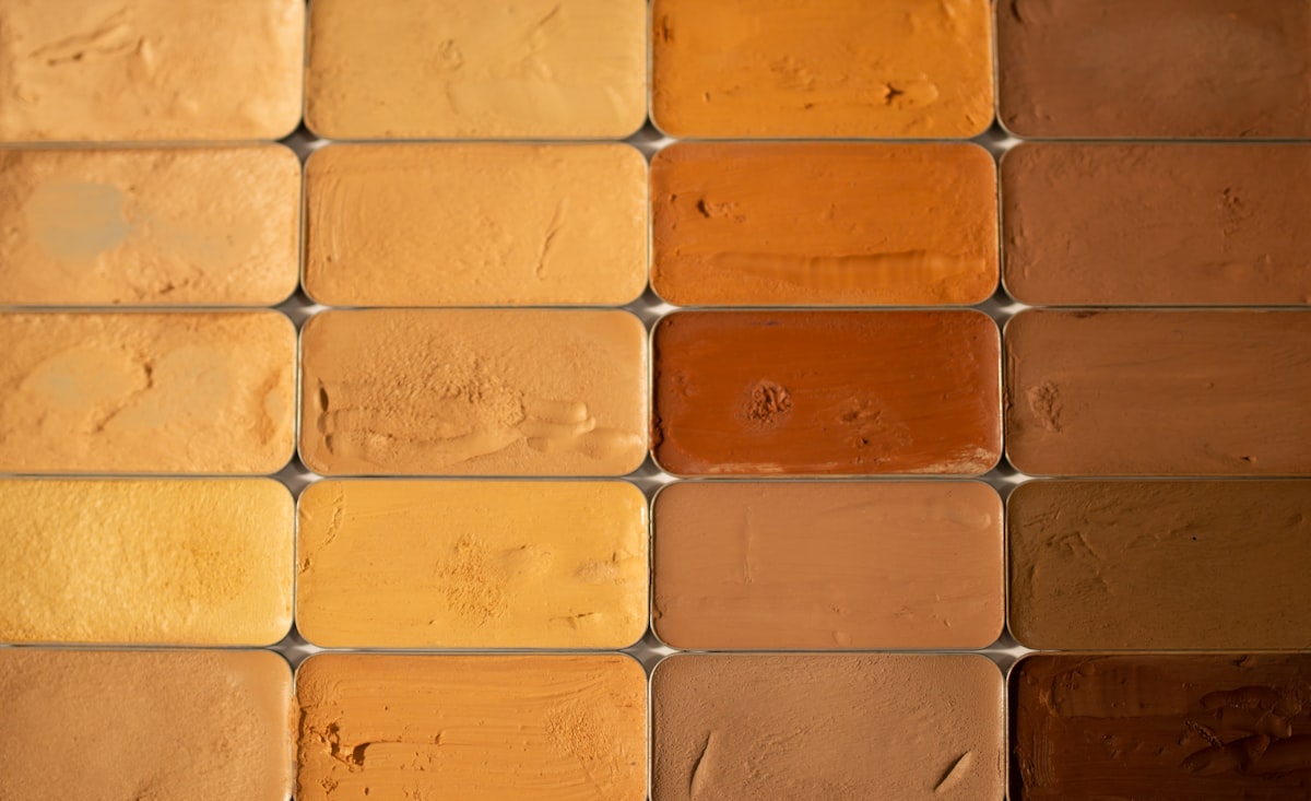 a group of different colors of paint on a wall related to Warm Up in Style: The Ultimate Guide to Chiminea Clay Outdoor Fireplace