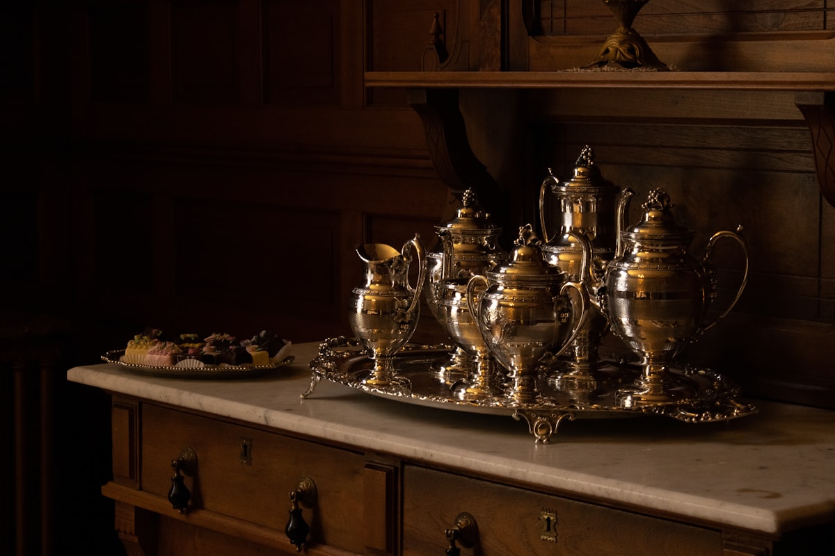 a group of glass jars on a counter related to Elegant Elegance: The Timeless Charm of Antique Sideboards and Servers