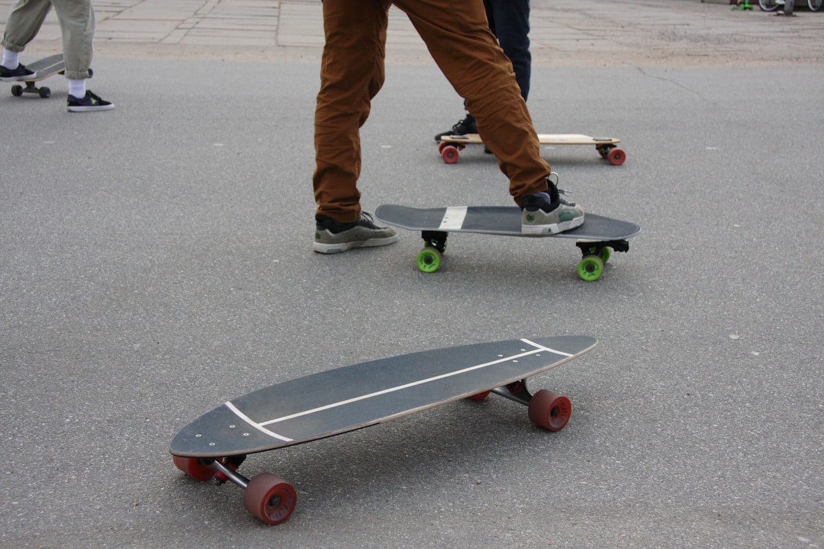 A group of people riding skateboards down a street related to Exploring the Versatility of Sideboards: A Comprehensive Guide