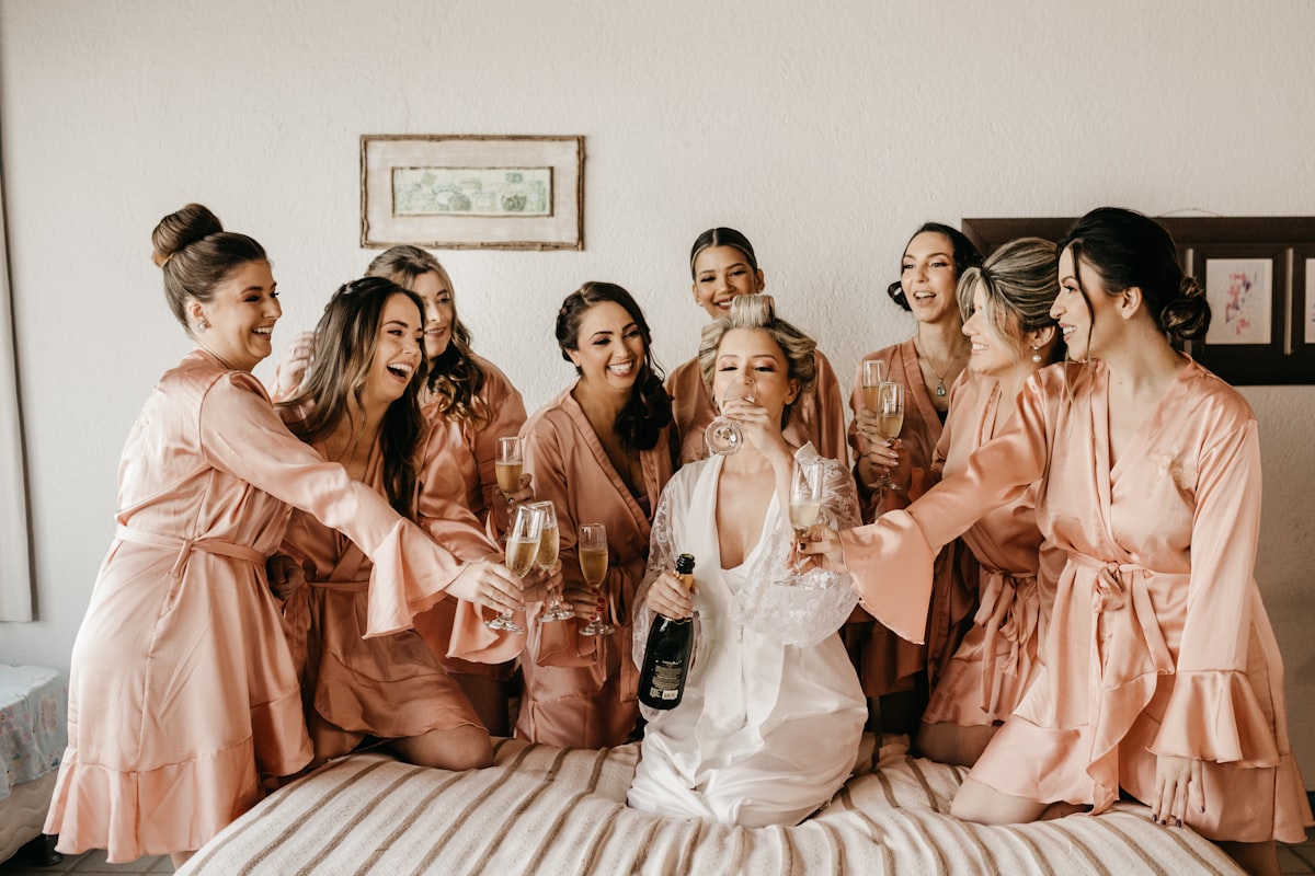 a group of women standing around each other related to Start Your Life Together: A Guide to Bed Bath & Beyond Wedding Registry
