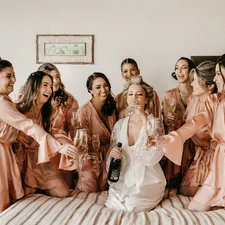 a group of women standing around each other related to Start Your Life Together: A Guide to Bed Bath & Beyond Wedding Registry