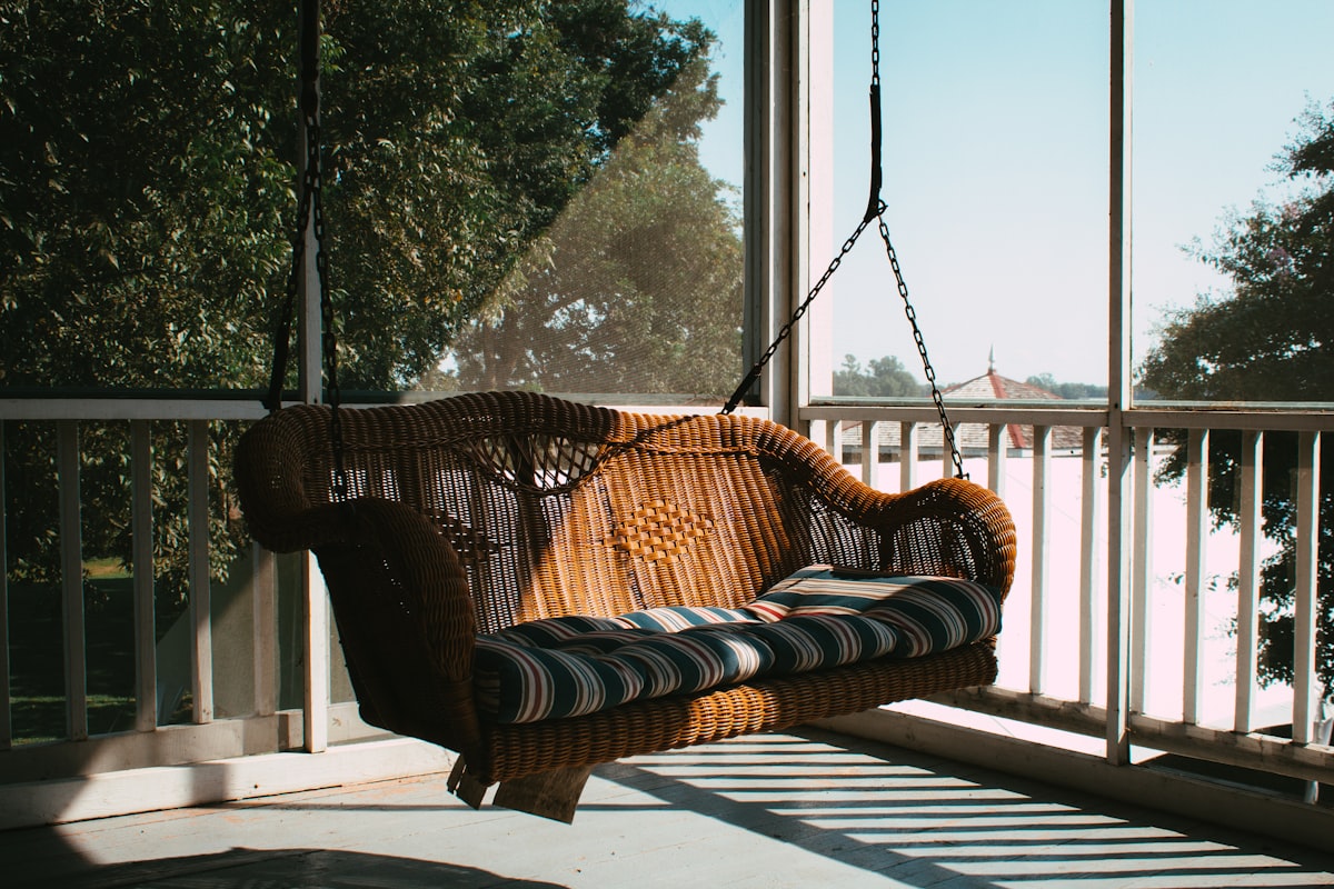 a hammock on a porch related to Relax and Recline in Luxury with a Porch Bed Swing