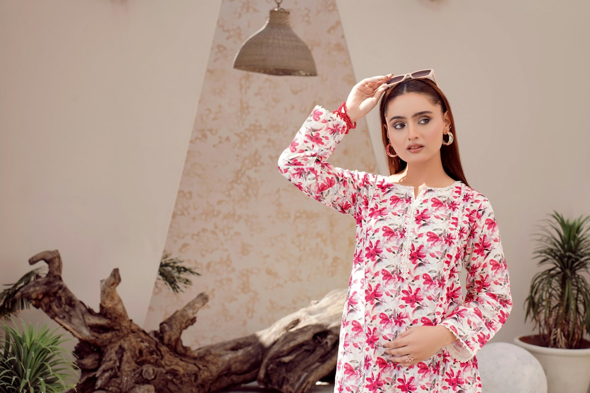 A high-resolution fashion portrait featuring intricate floral motifs and avant-garde styling. This photo captures the 2026 "Wilderkind" aesthetic, blending soft botanical textures with bold, professional art direction. Perfect for digital marketing headers, social media background assets, or editorial content centered on sustainability and contemporary style. related to Charming Bed Jackets for Ladies: The Ultimate Comfort and Style
