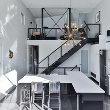 a kitchen with a staircase related to Building Up: A Step-by-Step Guide on How to Make a Loft Bed