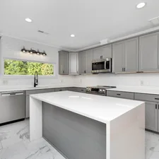 a kitchen with white cabinets related to Elegant Modern Kitchen Valance Curtains: Trends and Designs