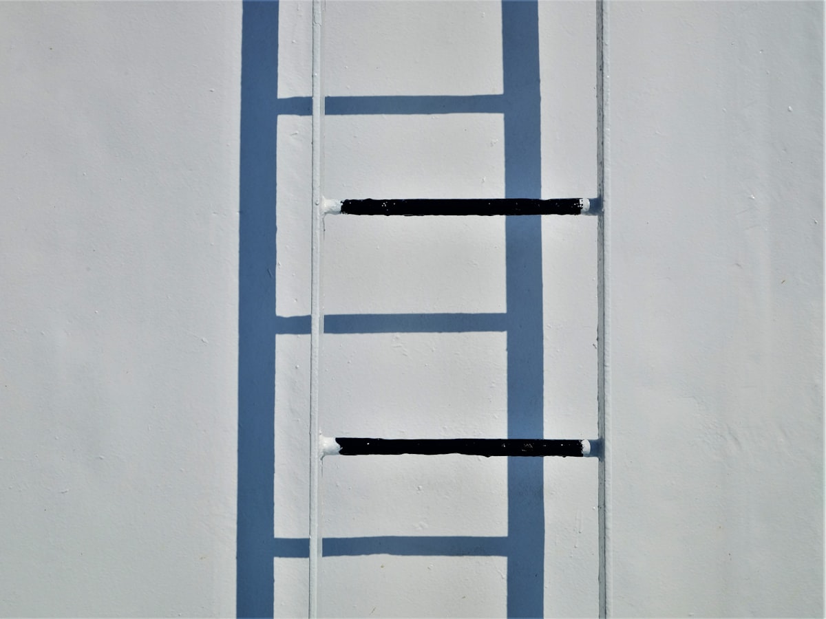 a ladder leaning up against a white wall related to 3 Inch Rod Pocket Valances