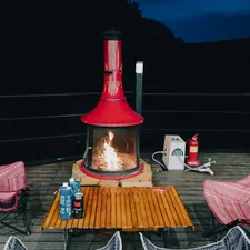 a lamp that is sitting on a table related to Masterpiece Cast Iron Chimineas at Home Depot