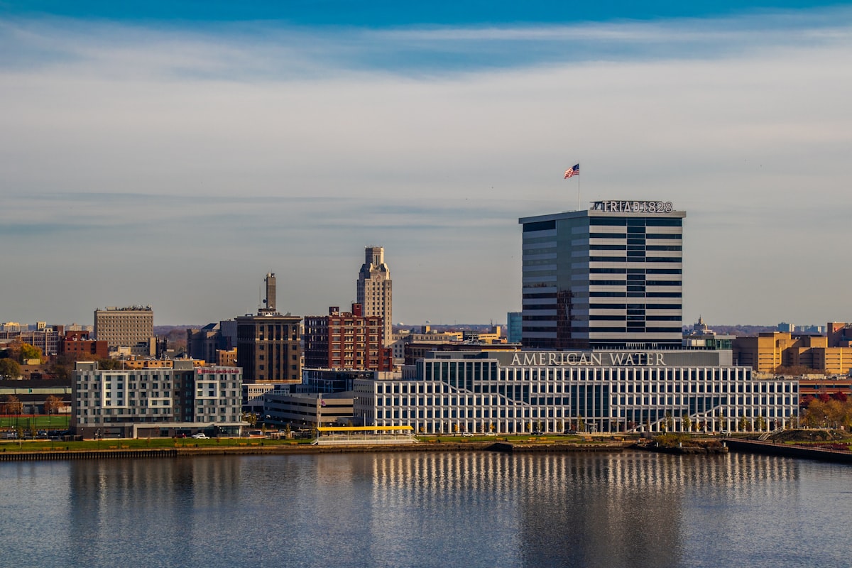 a large body of water with a city in the background related to Philadelphia's Bed Bug Epidemic: Causes and Consequences