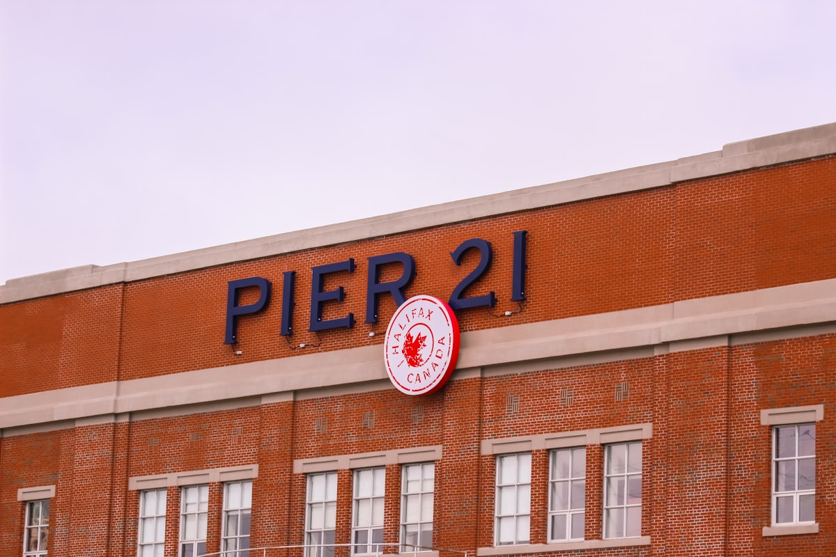 a large brick building with a clock on the front of it related to Transform Your Bedroom with Pier 1 Bedding: A Cozy Sanctuary Awaits