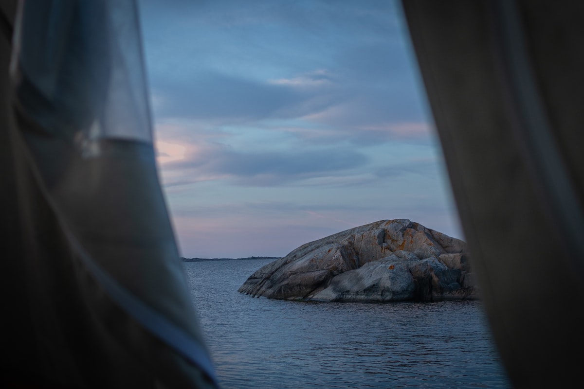 a large rock in the middle of a body of water related to No Sew Window Valances: A World of Elegance Without the Needle