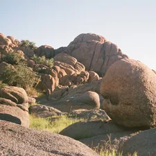 A large rock in the middle of a field related to Bed Bath & Beyond in Boulder: A Shopper's Paradise?