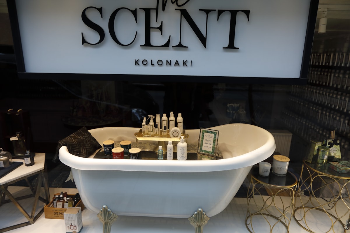 a large white tub with a white tub and a sign above it related to Exploring Home Essentials in Athens, GA
