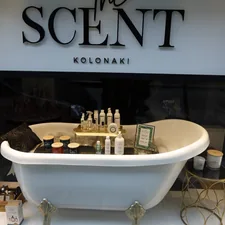 a large white tub with a white tub and a sign above it related to Exploring Home Essentials in Athens, GA