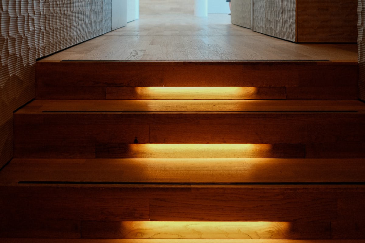 A light shines on a set of stairs related to DIY Wooden Valances: A Step-by-Step Guide