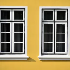 A little yellow house in the fishing town Büsum, North Sea related to Elevate Your Windows with Style: Creative Window Treatments and Valances Ideas