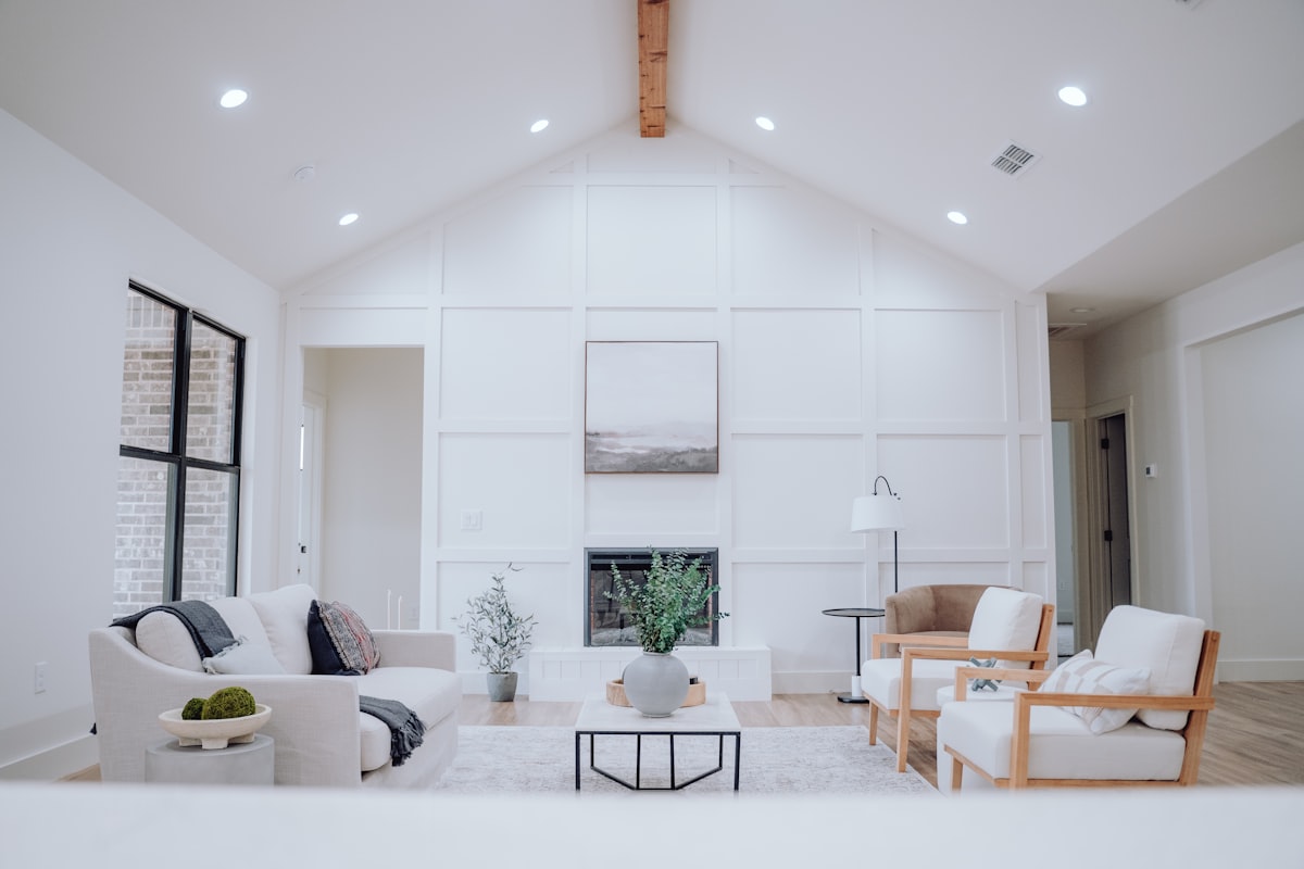 a living room filled with furniture and a fire place related to Enhance Your Home's First Impression with a Ceramic Tile Entryway