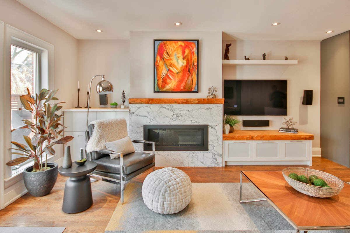 a living room filled with furniture and a fire place related to Enhancing Your Home Decor: The Timeless Appeal of Traditional Curtains and Valances