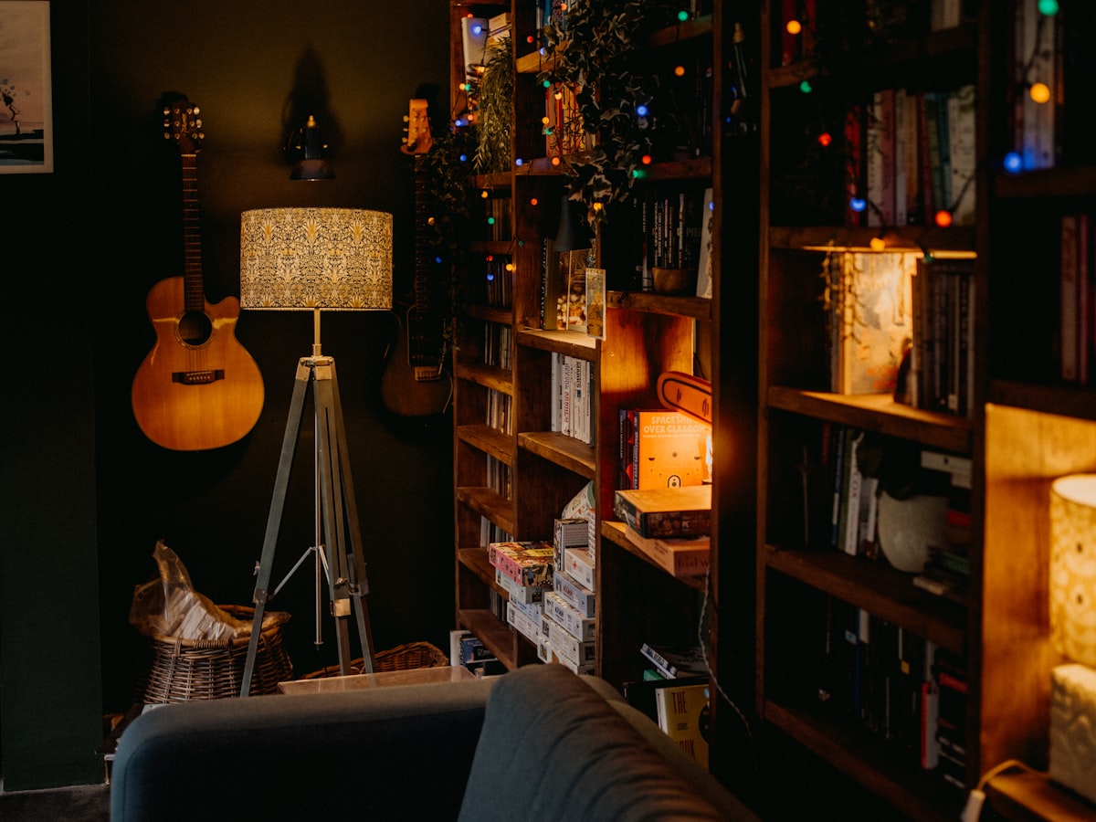 a living room filled with furniture and a guitar related to Elmo's Cozy Corner: Choosing the Perfect Toddler Bed