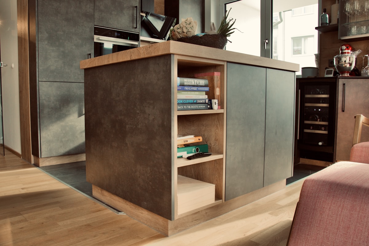 a living room with a couch and a book shelf related to Elevate Your Home Decor with a Sideboard with Sliding Doors