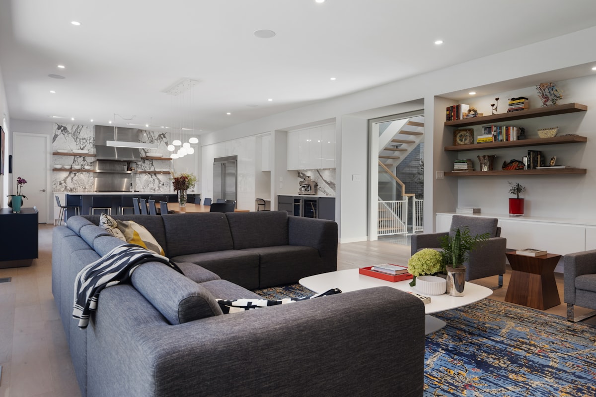 a living room with a couch and a coffee table related to Revolutionizing Your Home with Contemporary Window Valance Ideas