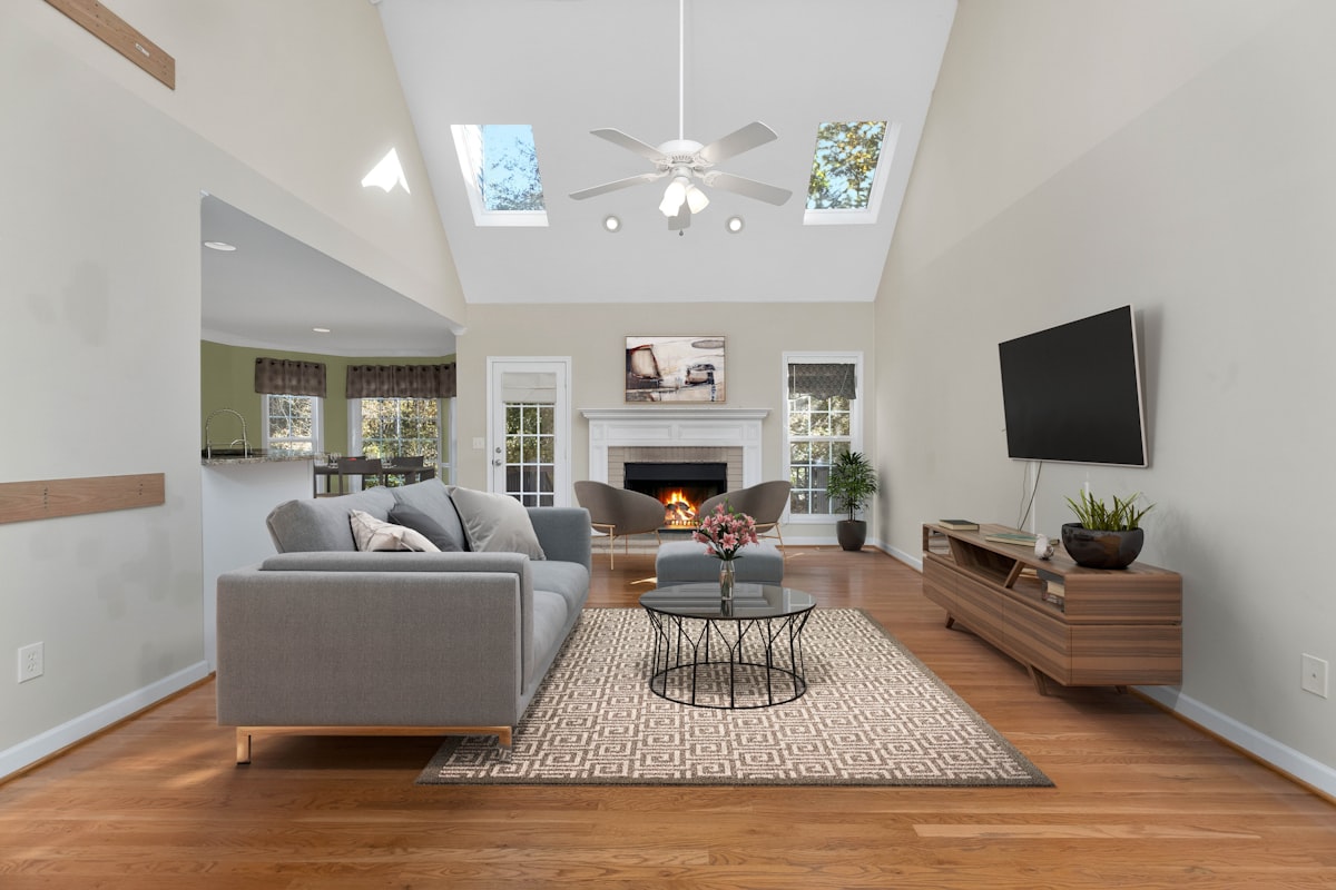 a living room with a fireplace related to Elevate Your Family Room with Stylish Valances