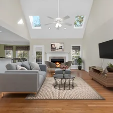 a living room with a fireplace related to Elevate Your Family Room with Stylish Valances