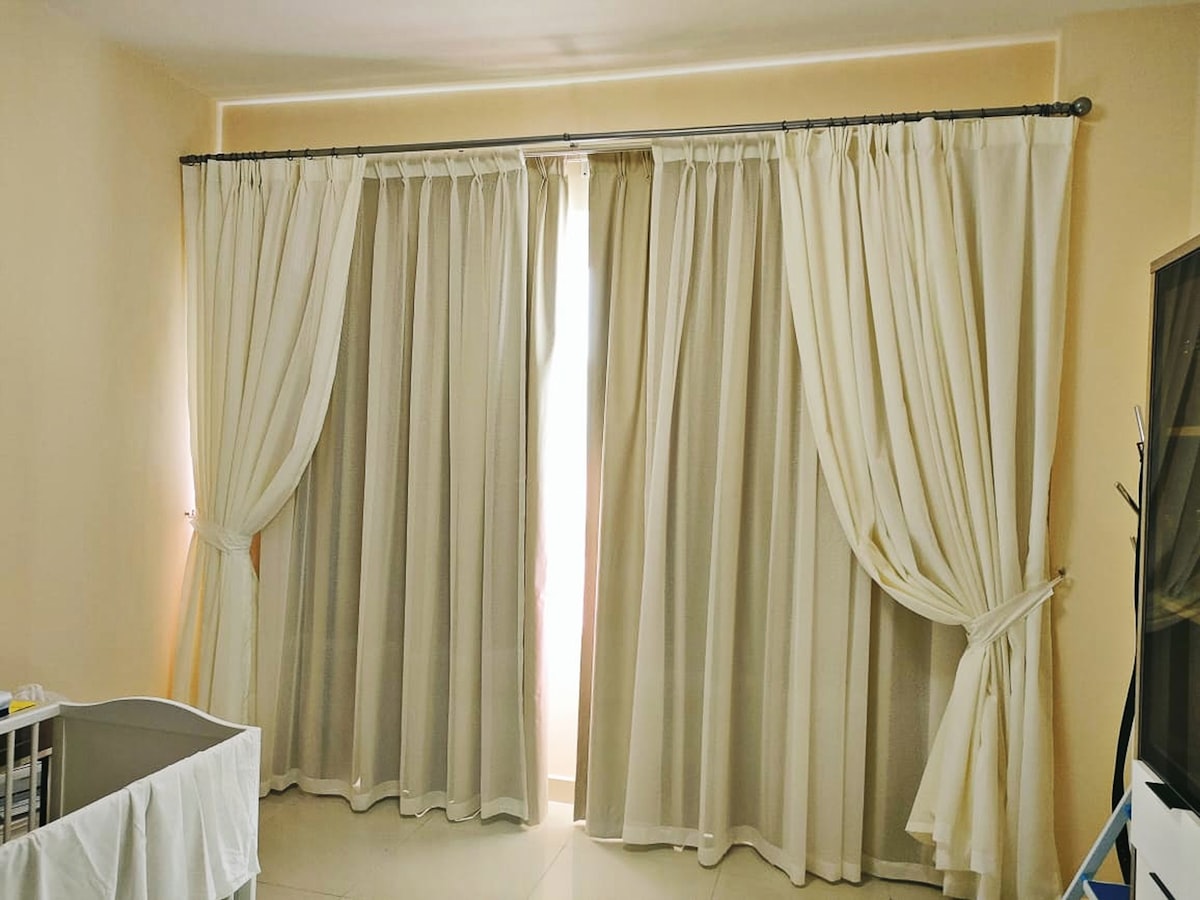 a living room with a white couch and curtains related to Curtains with Attached Valance