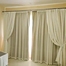 a living room with a white couch and curtains related to Curtains with Attached Valance