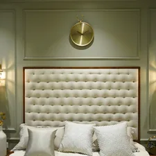 A luxurious bedroom with elegant lighting. related to Snuggle in Heavenly Luxury with a White Tufted Bed