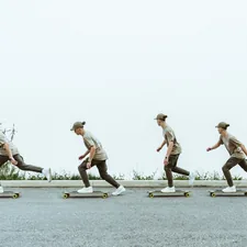 a man riding a skateboard down a street related to Exploring the Versatility of Sideboards: A Comprehensive Guide