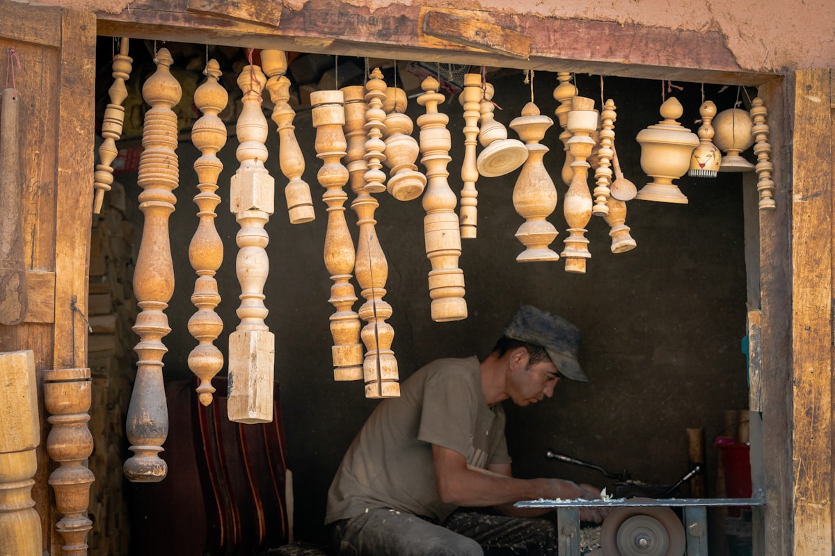 A man working on a piece of wood related to How to Make a Wooden Valance