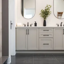 A modern bathroom vanity with two sinks and mirrors. related to Elevate Your Bathroom Style with Shower Curtains and Valances