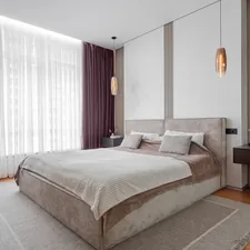 A modern bedroom with a comfy bed. related to Purple and Grey Bedding: Tranquil Tastes for Every Bedroom