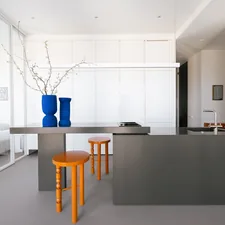 A modern kitchen features a minimalist design. related to Brighten Up Your Space with a Grey and Yellow Valance