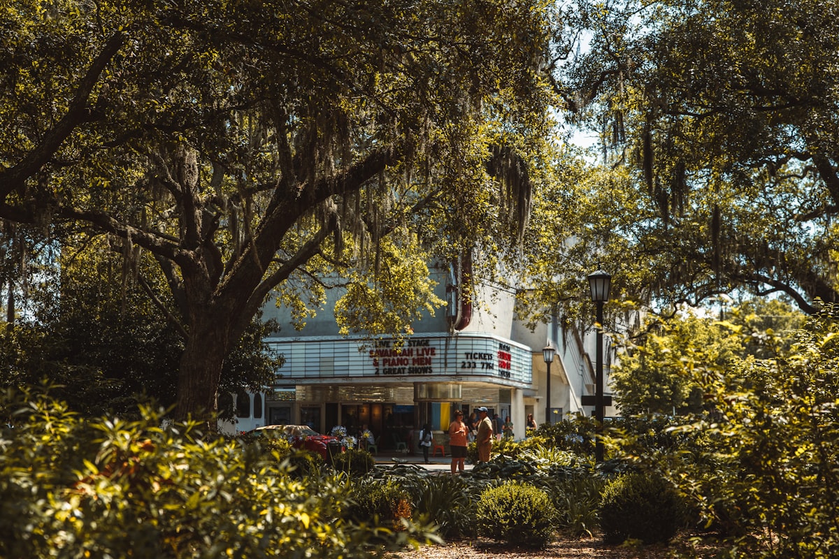 a movie theater surrounded by trees and bushes related to Savannah B&B Cottages