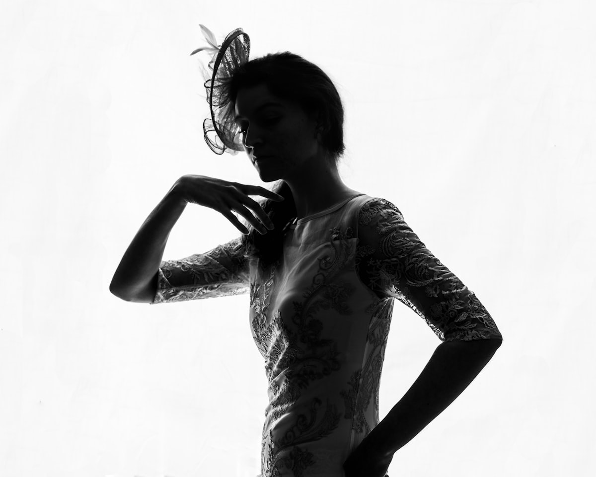 a person in a dress related to A Touch of Timeless Elegance: Styling White Lace Valances