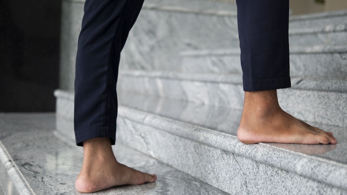 a person's legs and feet related to Sew a Valance: A Step-by-Step Guide for DIY Decor