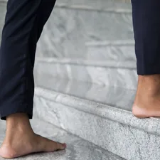 a person's legs and feet related to Sew a Valance: A Step-by-Step Guide for DIY Decor