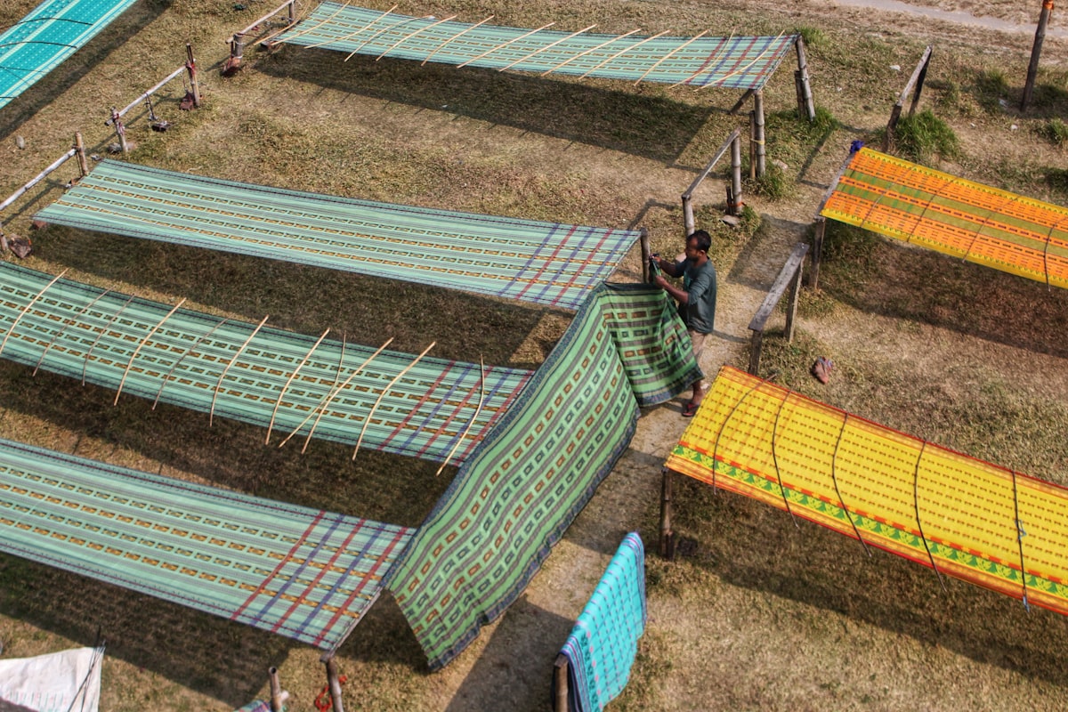 a person standing on a roof related to The Advantages of Fabric Raised Garden Beds for a Thriving Harvest
