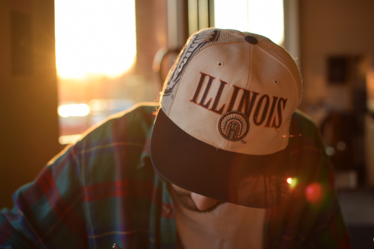 a person wearing a hat with illinois on it related to Charming Bed and Breakfasts in Illinois